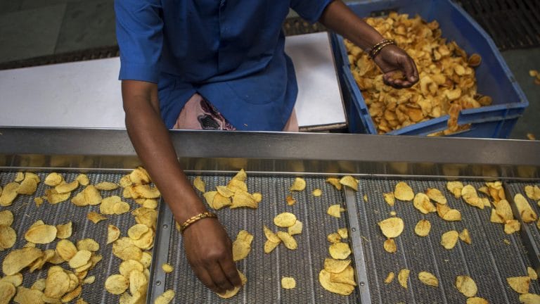 As Iran war hits ink supply, Japan’s biggest potato chip-maker is forced to tone down packaging