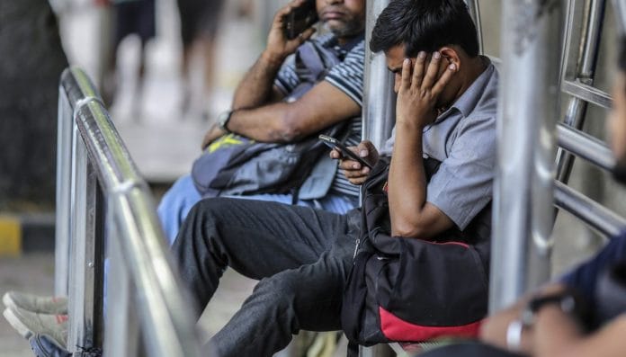 People using smartphones