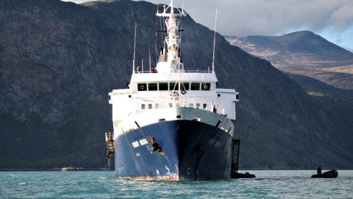 Approaching the Lyubov Orlova in Pangnirtung Fjord, Nunavut