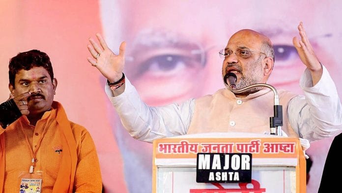 BJP National President Amit Shah addresses an election rally for Lok Sabha polls, at Ashta in Dewas district of Madhya Pradesh | PTI