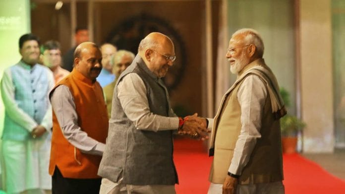 File photo | Prime Minister Narendra Modi shakes hands with BJP president Amit Shah in New Delhi. | Suraj Singh Bisht | ThePrint