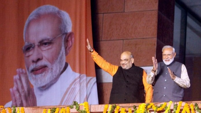 PM Narendra Modi with Amit Shah at the BJP headquarter | Photo: Praveen Jain | ThePrint