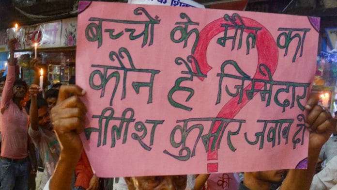 People take part in a march to protest AES deaths in Muzaffarpur | PTI