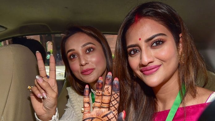 Actors and Trinamool Congress (TMC) MPs Mimi Chakraborty and Nusrat Jahan (R) at Parliament | PTI