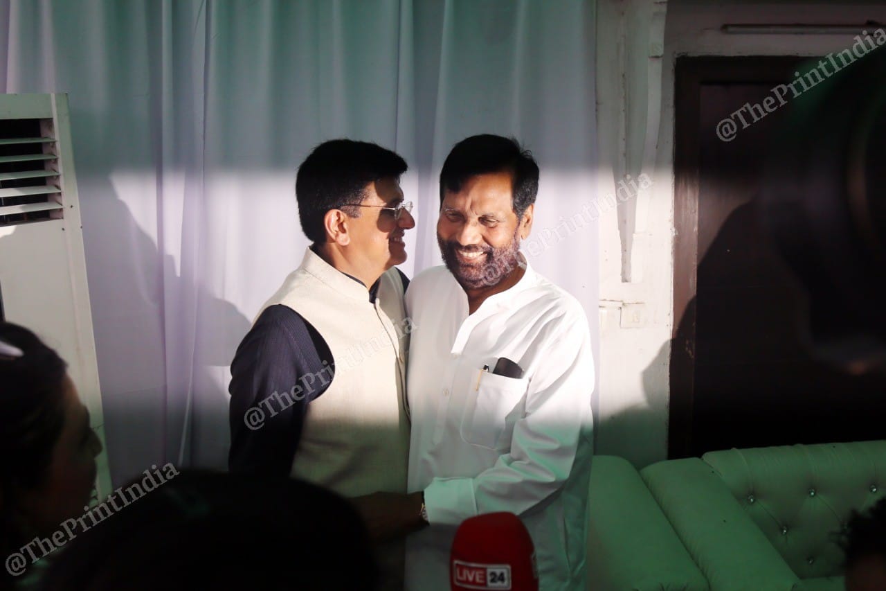 Railways Minister Piyush Goyal hugs Union Minister Ram Vilas Paswan at Shahnawaz Hussain's Eid party | Photo: Suraj Singh Bisht | ThePrint