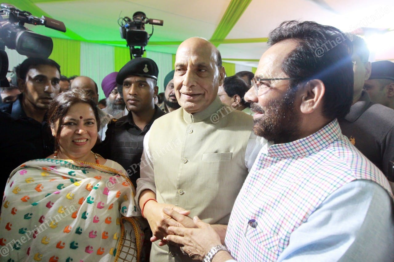 MP Meenakshi Lekhi and Defence Minister Rajnath Singh with the host | Photo: Praveen Jain | ThePrint