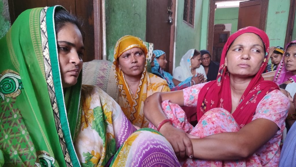 Twinkle Sharma's mother Shilpa Sharma (green saree) at their home | Ananya Bharadwaj/ThePrint