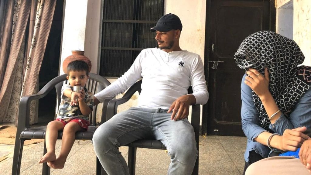 Kanak (L) with his parents. | Photo: Jyoti Yadav | ThePrint