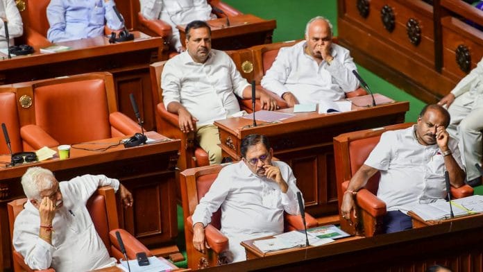 H.D. Kumaraswamy, G. Parameshwara, and R.V. Deshpande during the vote of confidence at Vidhana Soudha, in Bengaluru on 23 July 2019 | PTI