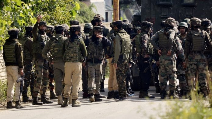 Army soldiers stand guard near the encounter site of a gunfight at Budgam district in central Kashmir | ANI Photo