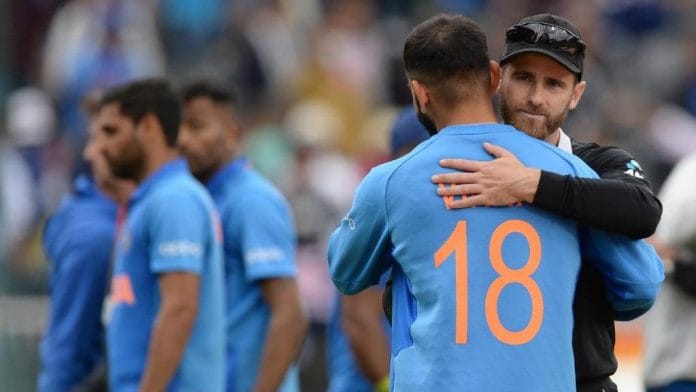 Indian captain Virat Kohli and New Zealand captain Kane Williamson embrace after the match. | @ICC | Twitter