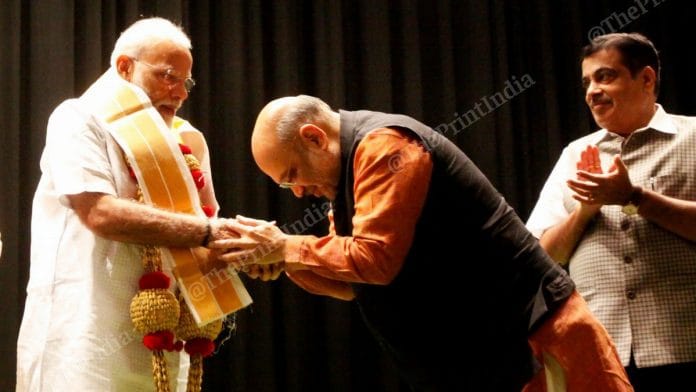 Home Minister Amit Shah greets PM Narendra Modi at BJP Parliamentary Party meeting