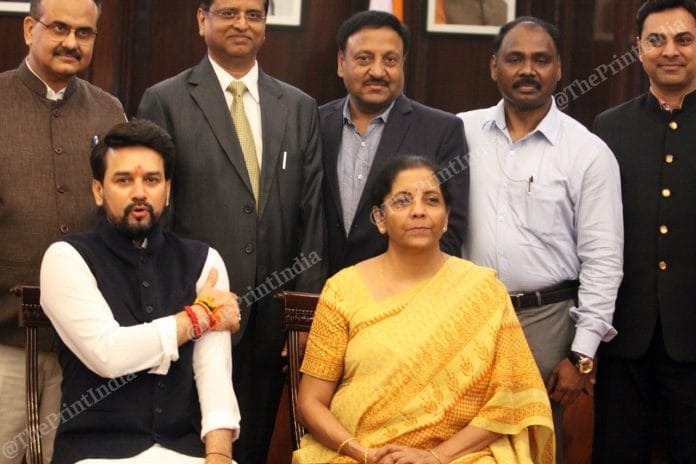 Finance Minister Nirmala Sitharaman and MoS Anurag Thakur with the budget team