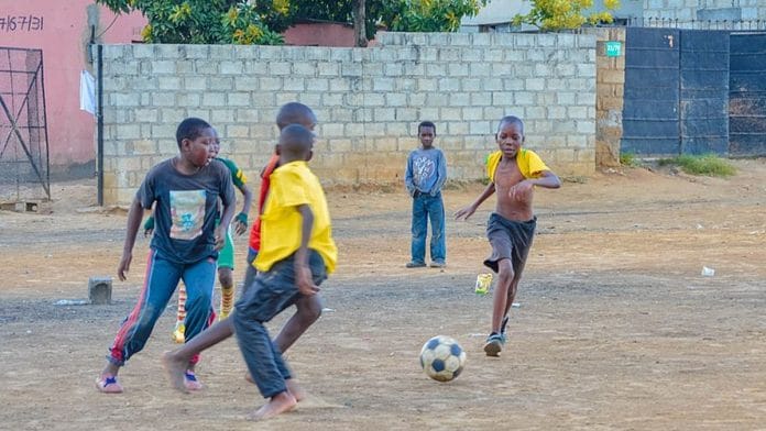 Children playing football