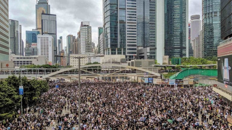 Hong Kong court bans protests at airport after clashes cripple flights