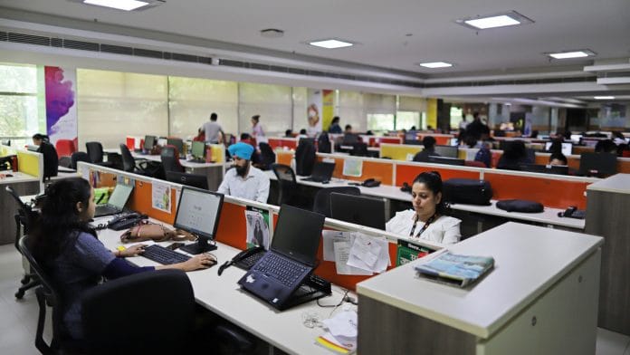 Representational Image | People working at an office | Anindito Mukherjee | Bloomberg