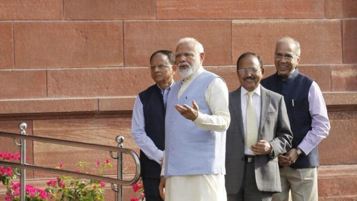 (L-R) Additional Principal Secretary P K Mishra , PM Narendra Modi, National Security Advisor Ajit Doval and Principal Secretary Nripendra Misra in South Block | ThePrint Photo by Praveen Jain