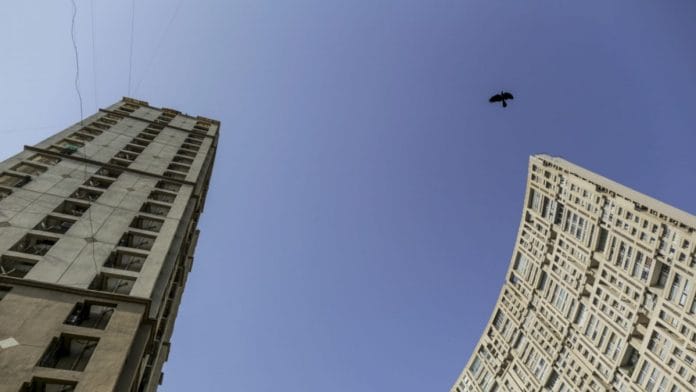 The Planet Godrej residential building, developed by Godrej Properties Ltd., right, stands in the Byculla area of Mumbai. (Representational Image) | Photographer: Dhiraj Singh | Bloomberg