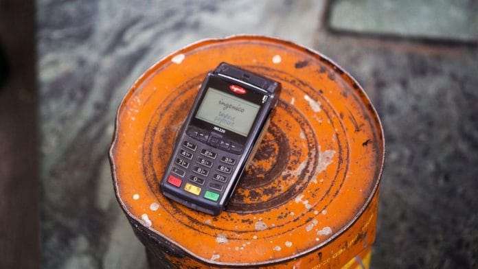 Customers pay after filling Compressed natural gas (CNG) at a fuel station of Indraprastha Gas Ltd., in Delhi. (Representational Image) | Photographer: Prashanth Vishwanathan | Bloomberg