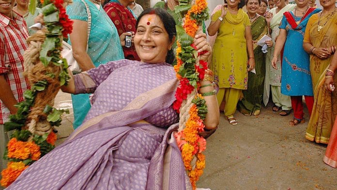 Sushma Swaraj on a swing