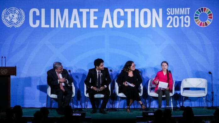 Swedish activist Greta Thunberg (right) speaks during the United Nations Climate Action Summit in New York | Photographer: Jeenah Moon | Bloomberg
