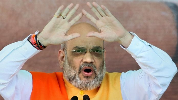 Amit Shah addressing a rally in Jamtara, Jharkhand | PTI Photo