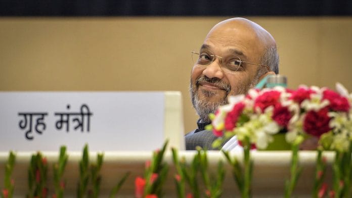 Home Minister Amit Shah looks at the 'Hindi Divas Samaroh' in New Delhi, September | PTI
