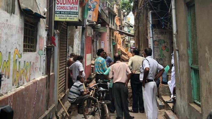 Debris of a collapsed building in Kolkata's Bowbazar area seen in the distance | Photo: Madhuparna Das | ThePrint