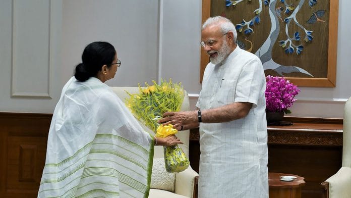 Mamata Banerjee greets Narendra Modi during a meeting in New Delhi | Twitter: @PMOIndia