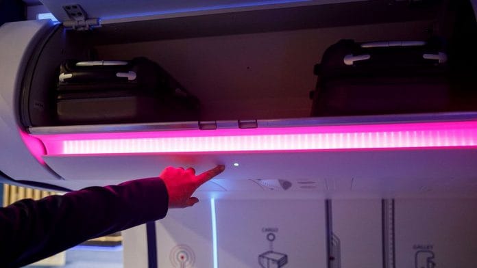 A carry-on bag space detecting overhead bin is demonstrated inside the Airbus SE Airspace connected aircraft passenger cabin during the APEX Expo in Los Angeles, California. | Photographer: Patrick T. Fallon | Bloomberg
