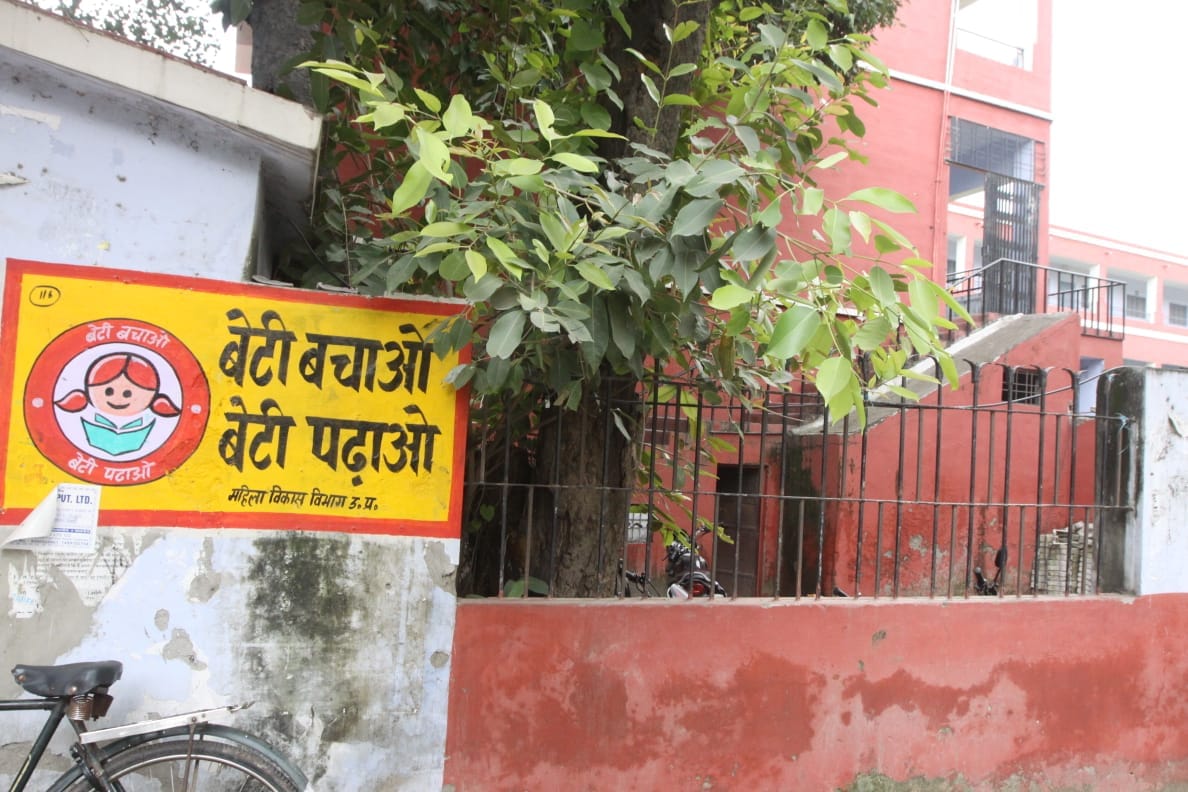 Posters of a womens helpline and the BJP's 'Save the Girl Child' campaign outside the Mumukshu complex | Praveen Jain