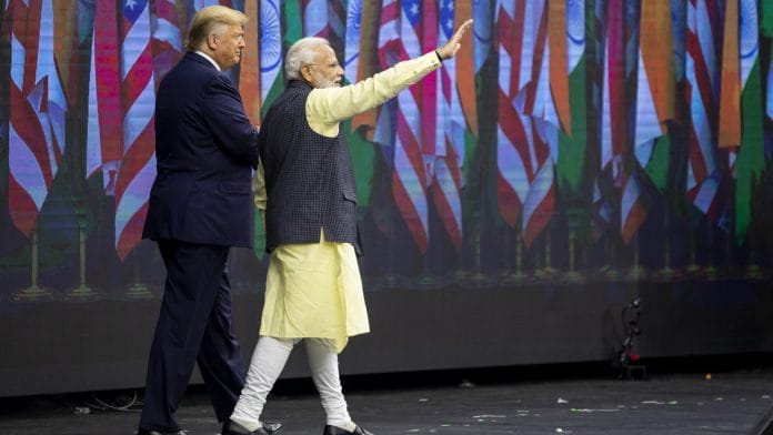 Narendra Modi and Donald Trump in Houston, Texas on 22 September | Photographer: Scott Dalton | Bloomberg