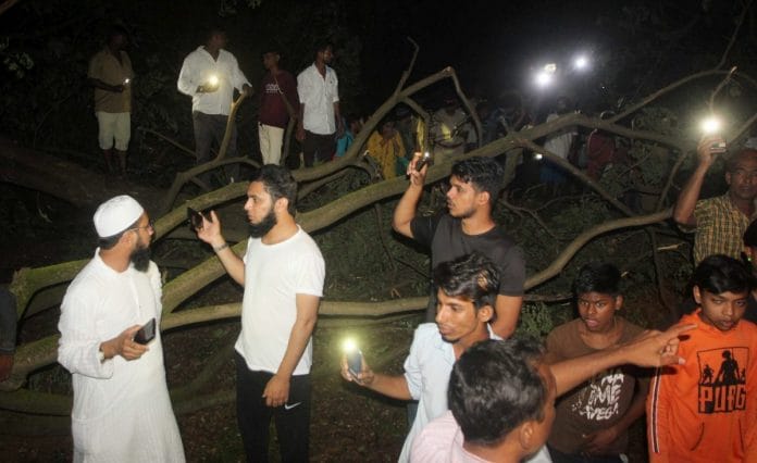 People protesting tree cutting at Aarey colony in Mumbai late Friday