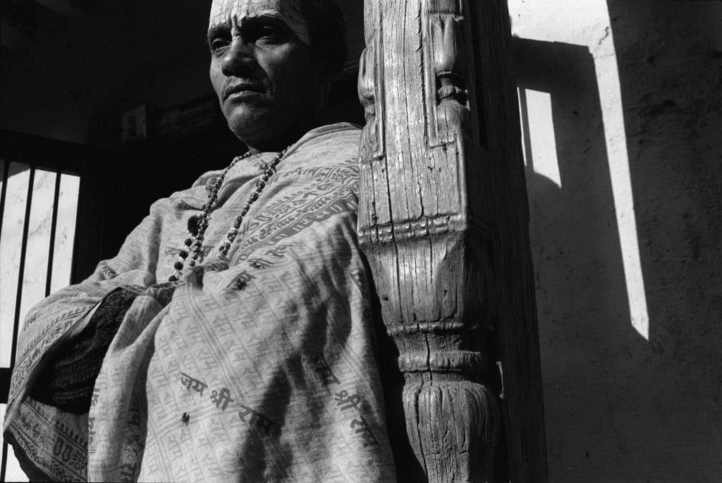Priest with Jai Shri Ram shawl in Ayodhya, 2002 | Photograph by Prashant Panjiar