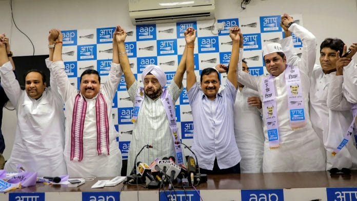 Four-time Congress MLA Parlad Singh Sawhney joins Aam Aadmi Party in the presence of party chief and Delhi Chief Minister Arvind Kejriwal at New Delhi. | PTI