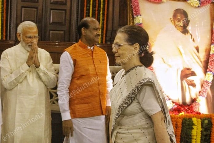 PM Modi, Congress President Sonia Gandhi and Lok Sabha speaker Om Birla at the Central Hall of Parliament on Mahatma Gandhi's 150th birth anniversary. | Praveen Jain | ThePrint