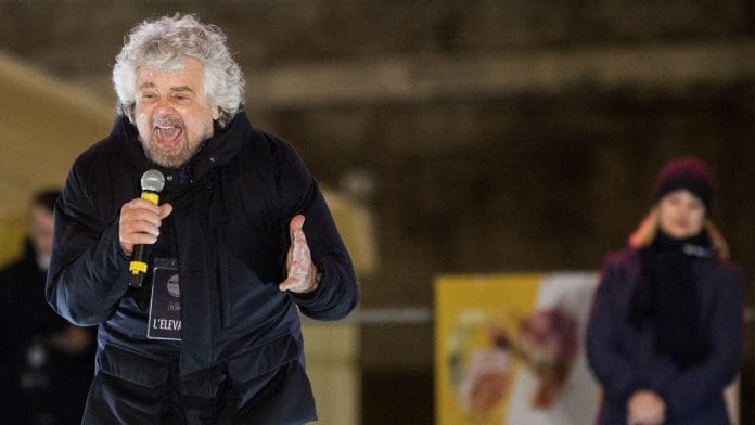 Beppe Grillo, comedian-turned-politician and founder of the Five Star Movement, speaks during a general election campaign rally for Luigi Di Maio, leader of Italy's anti-establishment Five Star Movement. | Photographer: Alessia Pierdomenico | Bloomberg
