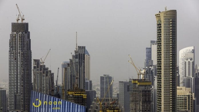 Residential and commercial skyscrapers stand in downtown Dubai, United Arab Emirates | Photographer: Christopher Pike | Bloomberg