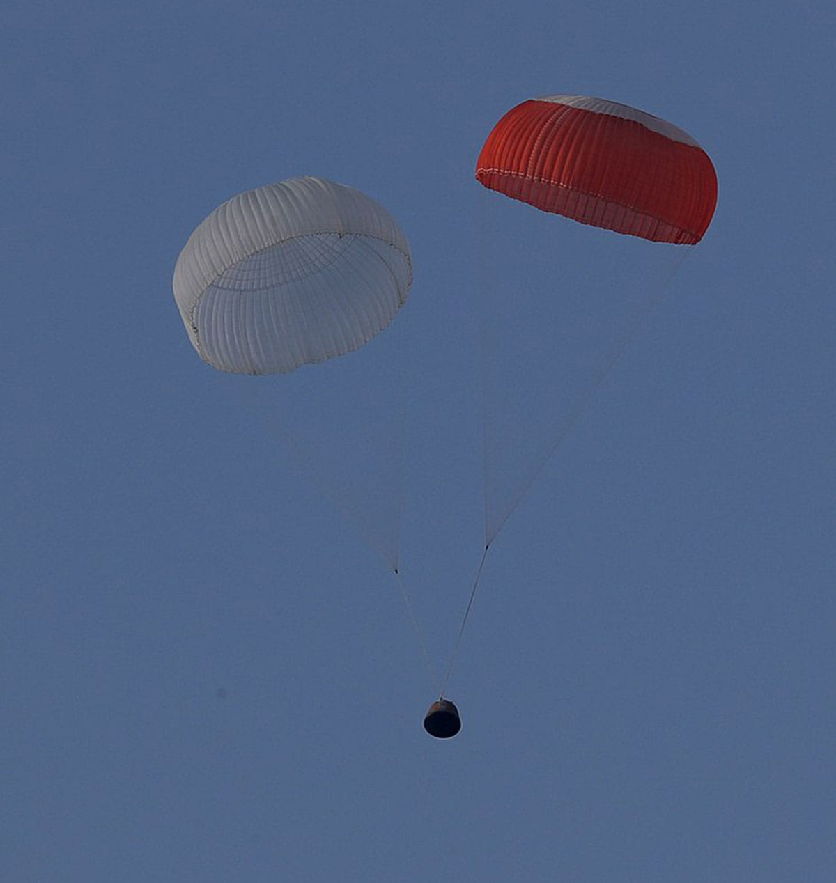 Dummy Gaganyaan crew module descends under parachutes, after Pad Abort Test conducted on 5 July 2018