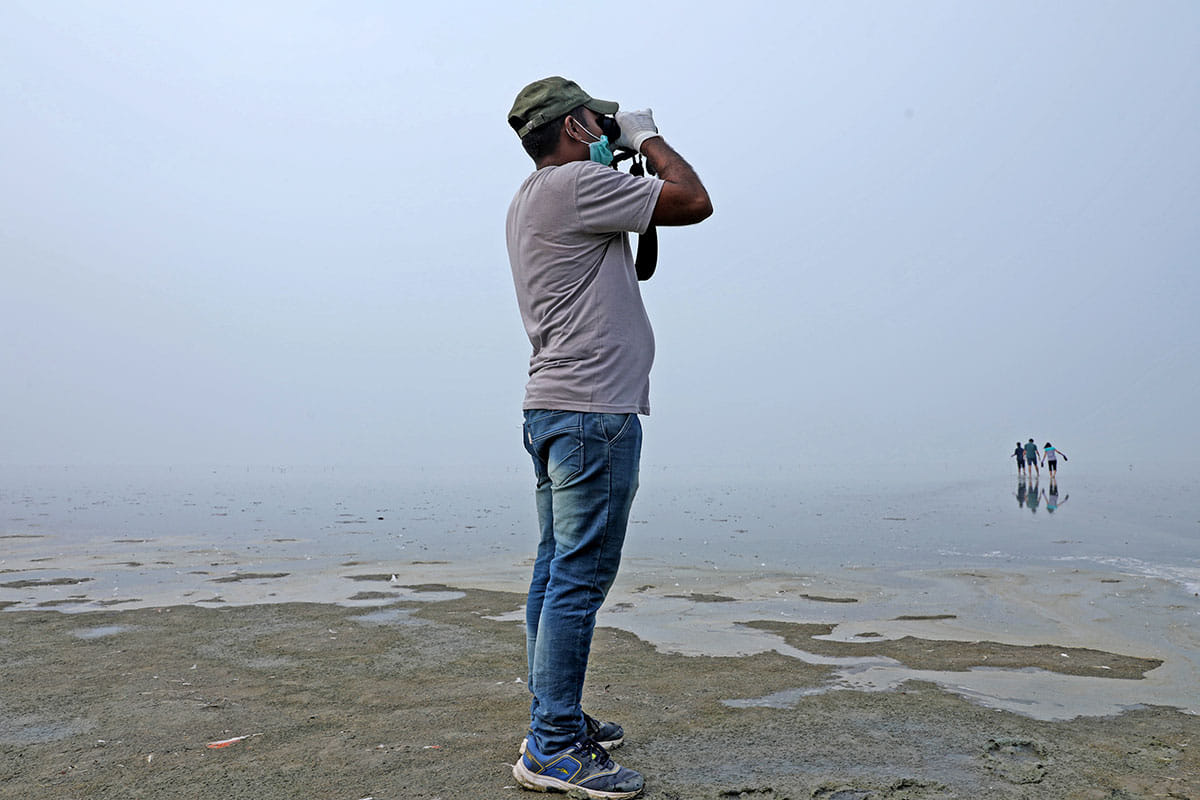 Forest department personnel working at the Sambhar Lake. | Photo: Bahar Dutt