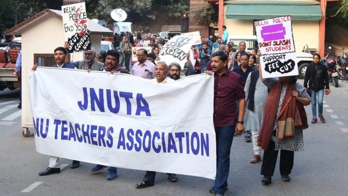 JNU teachers protest against the police brutality shown toward students during their protest. | Photo: Suraj Singh Bisht | ThePrint