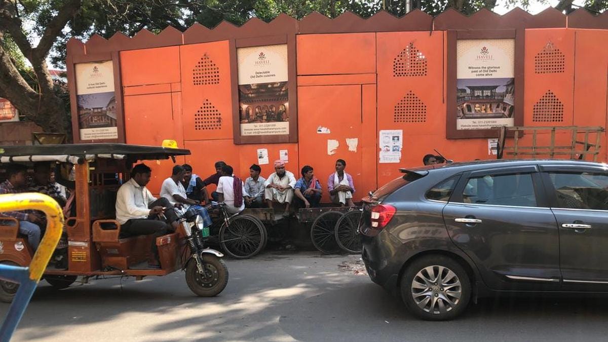 Rickshaw pullers outside Jama Masjid discussing the Ayodhya verdict | Photo: Revathi Krishnan | ThePrint