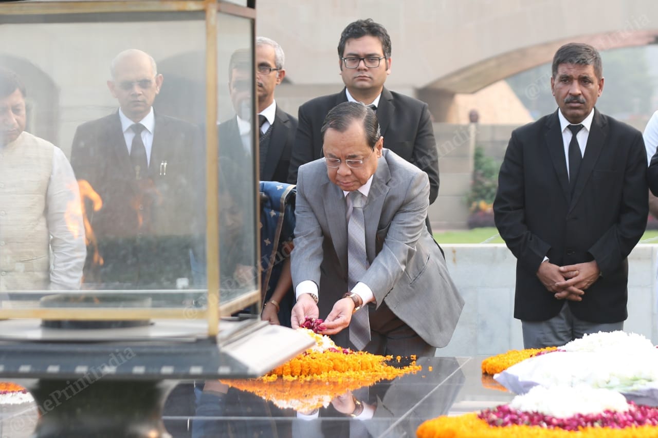 Justice Gogoi with wife Rupanjali Gogoi pays homage at Mahatma Gandhi's Samadhi at Raj Ghat | Photo: Suraj Singh Bisht | ThePrint
