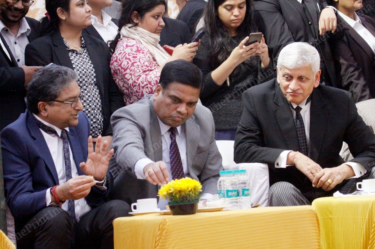 Supreme Court Judges Vinnet Saran (L), Sanjiv Khanna (C) and Uday Umesh Lalit (R) in conversation | Photo: Praveen Jain | ThePrint