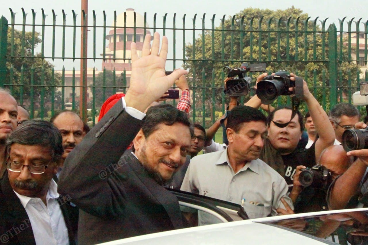 Justice SA Bobde waves at the photographers outside the Supreme Court | Photo: Praveen Jain | ThePrint