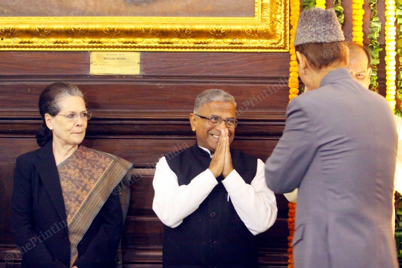 Congress leader Ghulam Nabi Azad greets party President Sonia Gandhi and Harivansh Narayan Singh, Deputy Chairman of Rajya Sabha