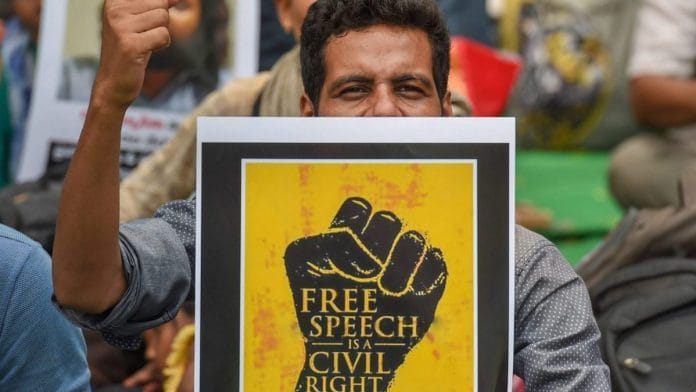 File photo of activists campaigning against repression of free speech rights | PTI