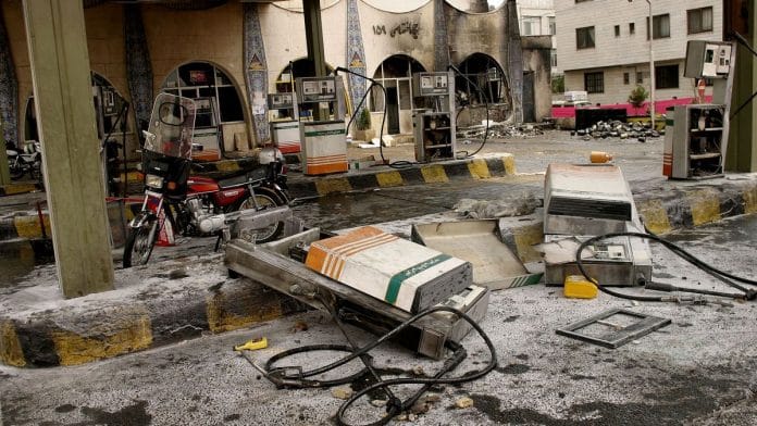 (File photo) Burned out pumps and equipment seen at a looted and burned out gas station in northwest Tehran, Iran in 2007. | Photographer: document IRAN | Houman Khanipour