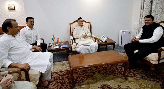 Maharashtra Chief Minister Devendra Fadnavis and Deputy Chief Minister Ajit Pawar along with Maharashtra Governor Bhagat Singh Koshyari (centre) after the oath taking ceremony at Raj Bhavan in Mumbai. | ANI