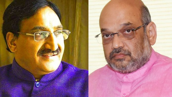 HRD Minister Ramesh Pokhriyal ‘Nishank’ (L) and Home Minister Amit Shah
